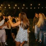 Women Dancing to Spring Fling Playlist