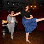 couple swing dancing to illustrate retro dance fever