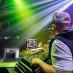 5 Simple Tips to Conquer Mic Fear illustrated by a dj using a mic during a club set