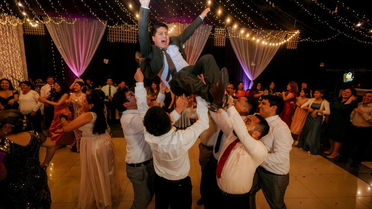 Secret to Full Dancefloor at a Wedding with guests dancing together