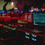 Professional DJ sound system setup with speakers and mixer at a live event venue
