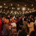 Guests enjoying an effortless event with smooth entertainment, natural conversation, and a welcoming atmosphere.