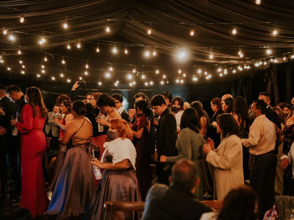 Guests enjoying an effortless event with smooth entertainment, natural conversation, and a welcoming atmosphere.